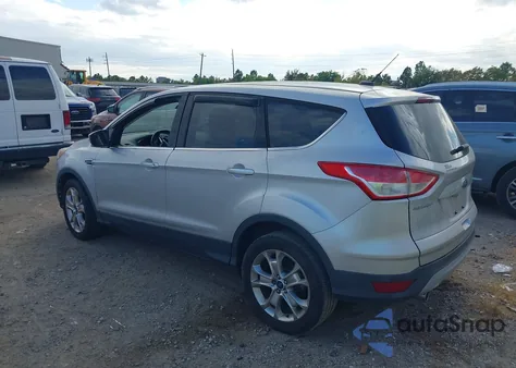 2013 Ford Escape Sel z USA, uszkodzony, nr VIN 1FMCU0H93DUC57278